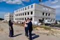 Депутат Тамбовской областной Думы Дмитрий Пузанов совместно с председателем Совета депутатов Рассказовского муниципального округа Дмитрием Зозуленко посетили строительную площадку новой школы